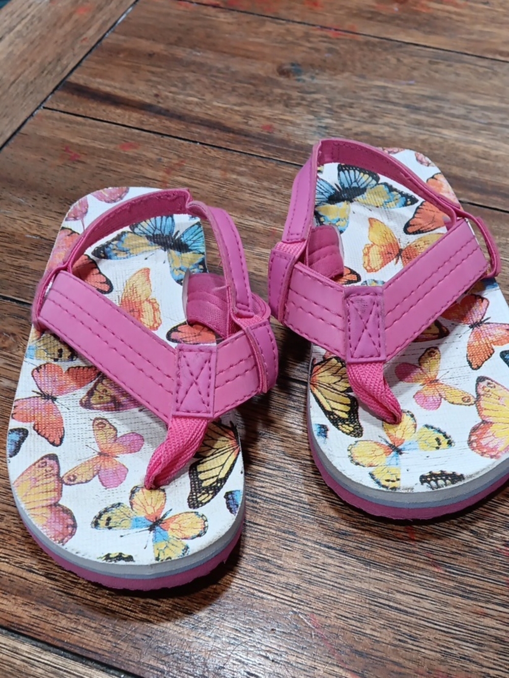 Kids Sandals With Butterflies And A Back Strap.